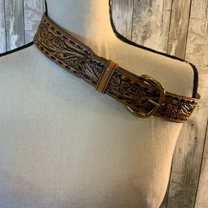Leather stamped belt. Like new condition. Size 28